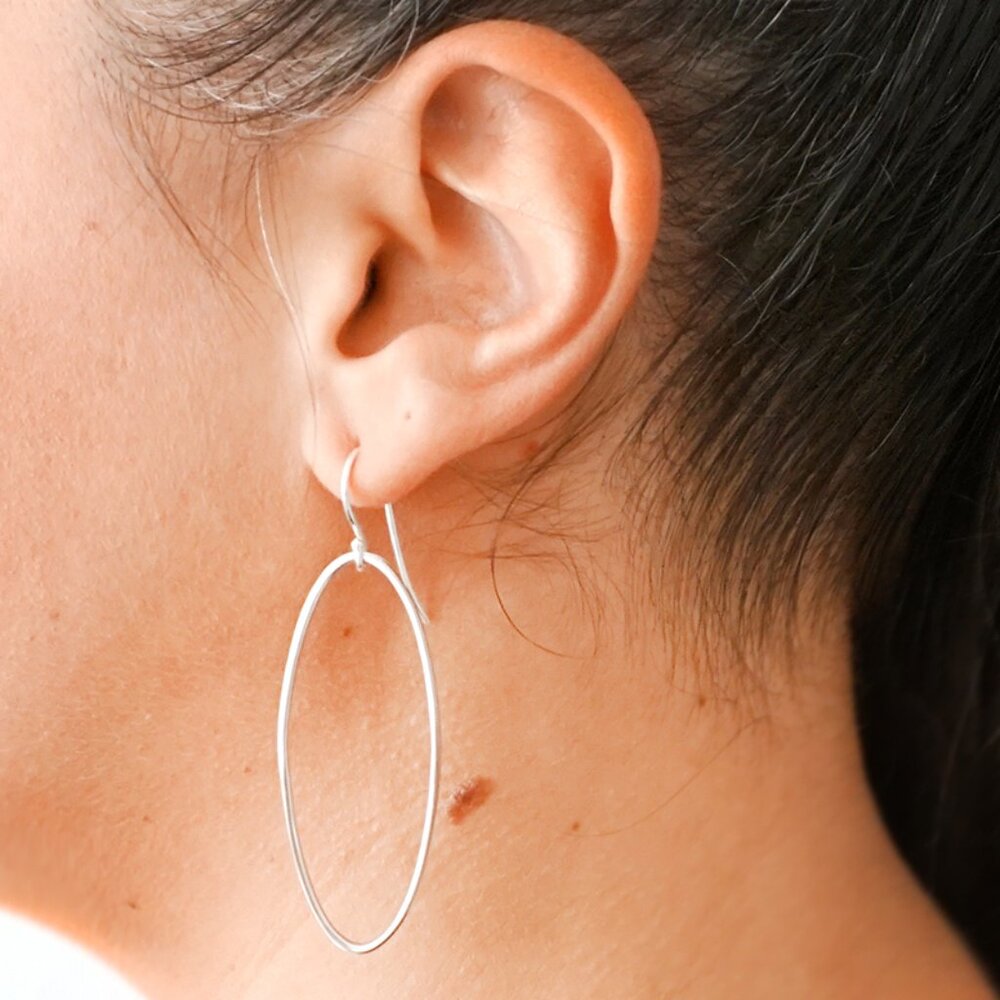 Sterling silver oval hoop earring